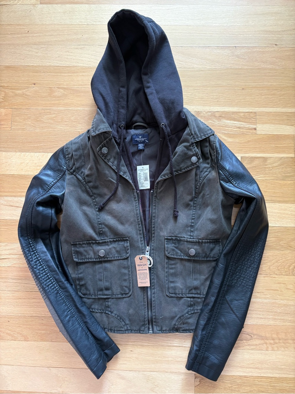 American Eagle Outfitters layered Jacket with faux leather sleeves and hoodie.